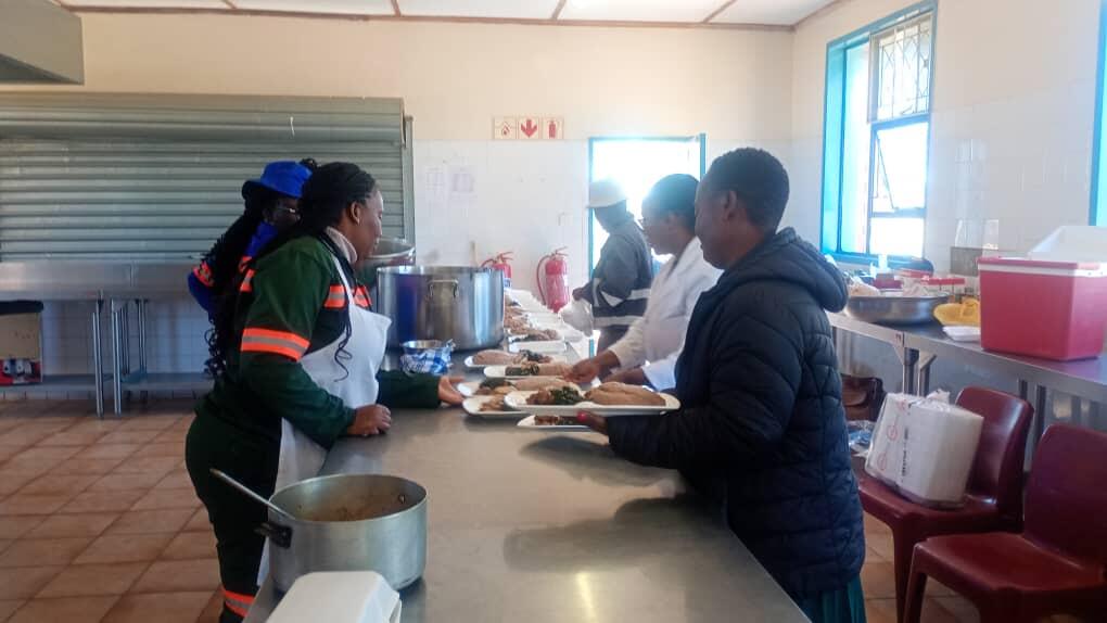 Colleagues preparing lunch.jpeg